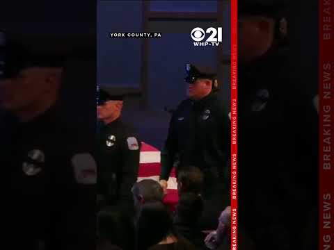 Officers give final salute, pay respects to fallen policeman killed in mass shooting