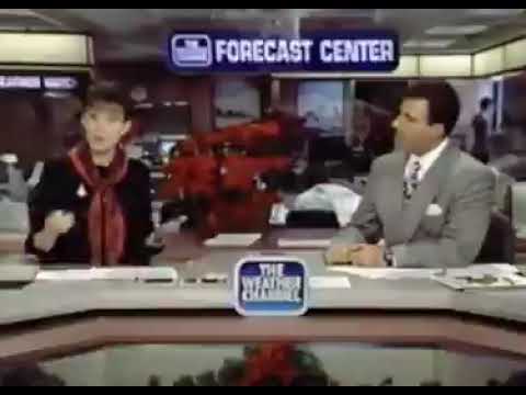 It's Christmas Eve in 1993 and the weather channel is playing on the TV with a house full of family