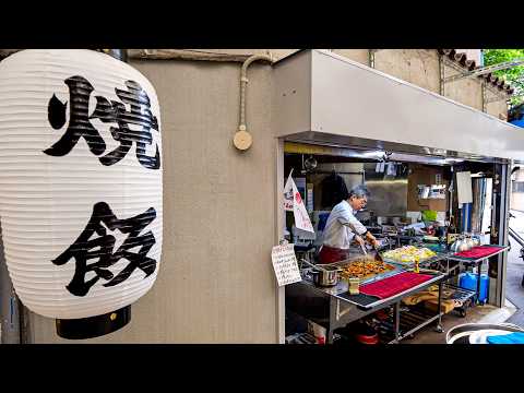 The food cart in the open kitchen!The chef grills yakisoba on a hot plate.