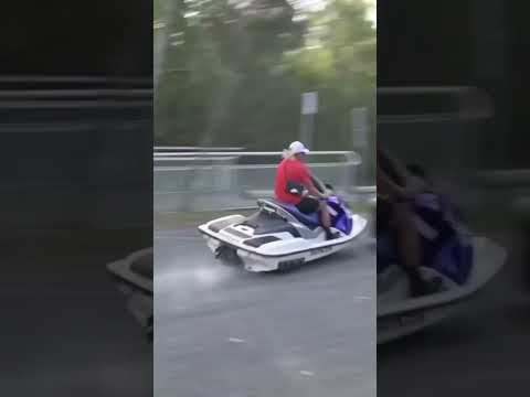 Jet ski crashes into a car and runs away!