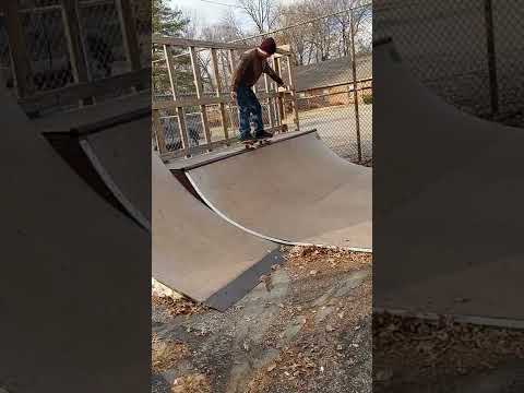 Kyle Skateboarding the spine!