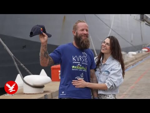 Solo ocean rower rescued from Cyclone Alfred reunited with wife