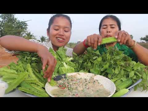 Enjoying Fresh Village Vegetables with Delicious Sauce