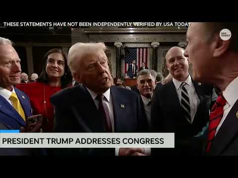 Trump address to nation ends; president shakes hands of members of Congress who congratulate him