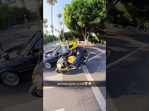 idiot driver almost hits motorcyclist!