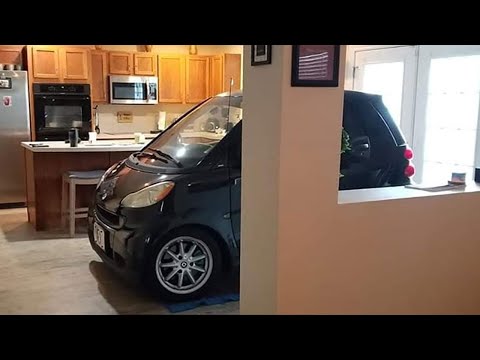 Man parks Smart car in kitchen so it won't blow away during hurricane