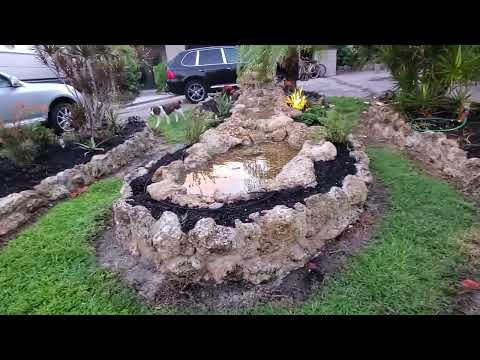 Front botanical garden with pondless waterfall