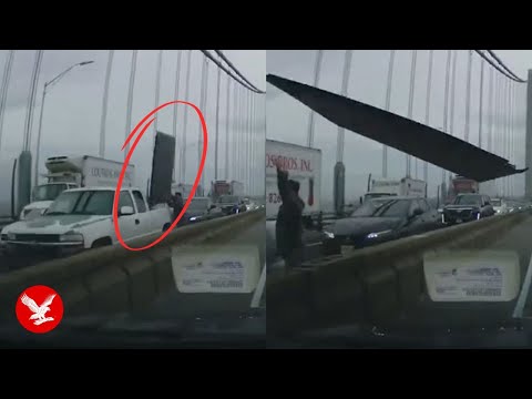 Terrifying moment board flies off truck and through family's windshield on New York bridge