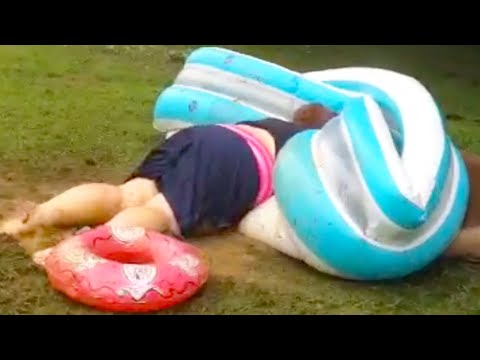 WOMAN SLIDES INTO A POOL! | WATER SLIDE FAILS