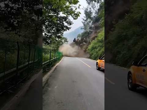 A cascade of mountain rocks crashed down onto a road in China. #shorts