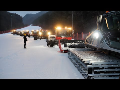 The process of creating a huge ski slope with the most powerful horsepower tank.