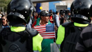 Tensions rise as migrants gather at Mexico-US border crossing