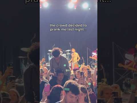 crazy crowd turns their back at a concert