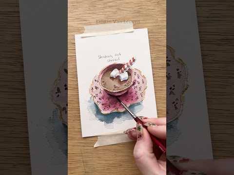 Watercolor hot cocoa in a Christmas cup for day 3 of our 12 days of watercolor holiday card making