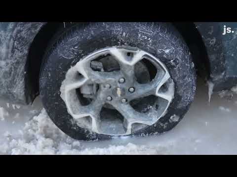 Cars freeze to street on Milwaukee's east side after water main break