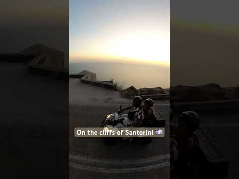 Cruising through the Santorini, Greece Cliffs