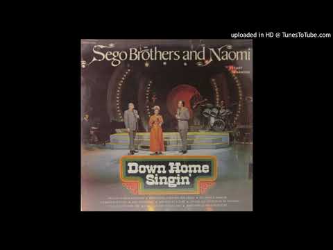 WHO AM I---SEGO BROTHERS & NAOMI