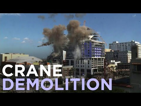 Damaged cranes destroyed in controlled explosion